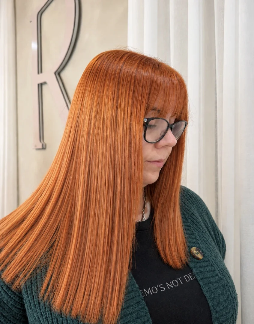 Smooth, glossy copper hair after a Nanoplasty straightening treatment at Runway Tamworth